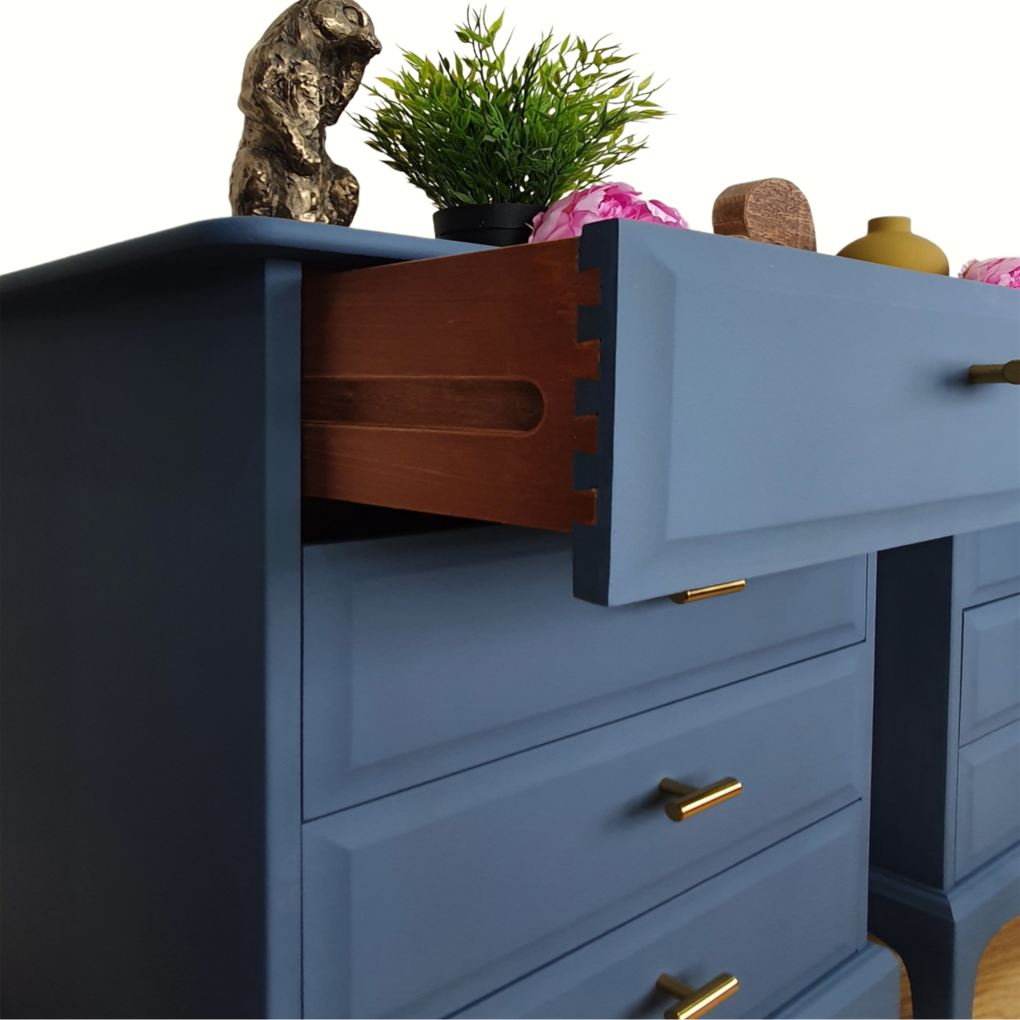 Pair of blue four drawer Stag Minstrel bedside cabinets