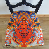 Black-painted, upholstered chair