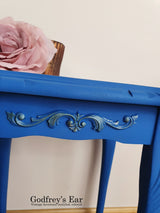 Blue side table, with découpaged top