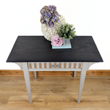 Writing table in beige with dark stained top