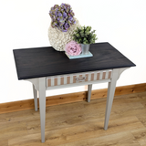 Writing table in beige with dark stained top