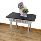 Writing table in beige with dark stained top