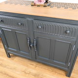 Ercol Old Colonial sideboard in dark neutral dark green with stencilled top