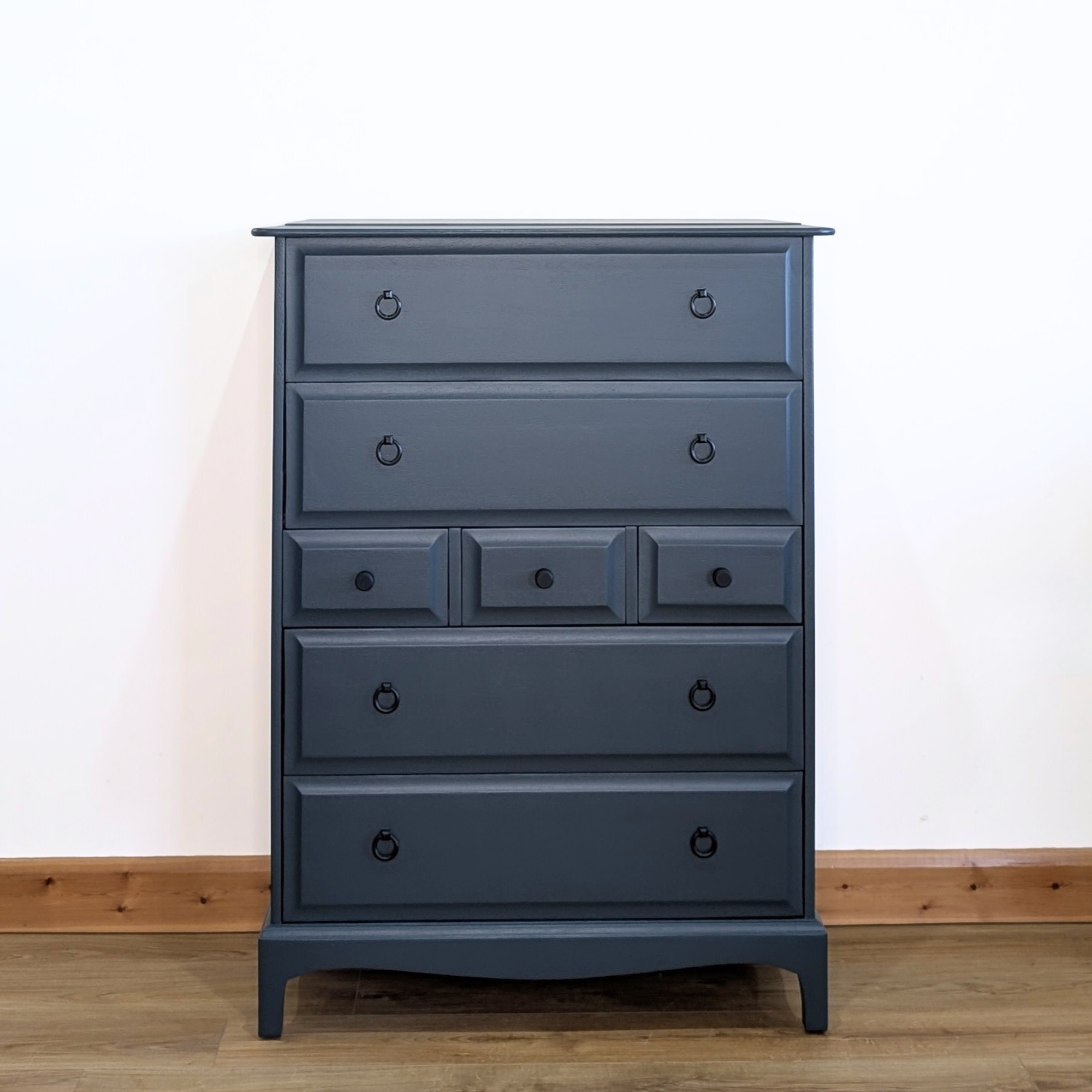 Stag Minstrel 7-drawer tallboy in dark neutral blue