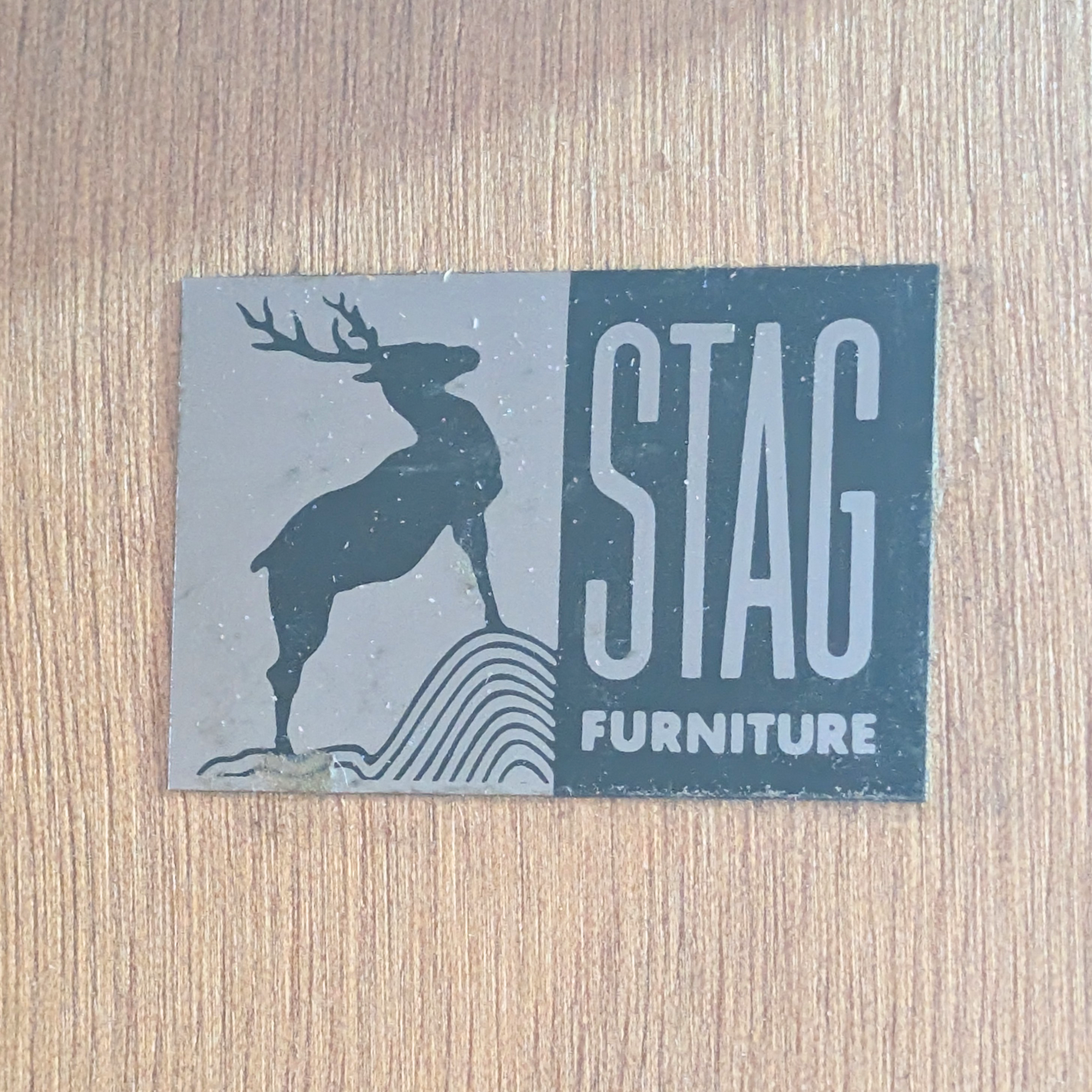 Stag Minstrel 7-drawer tallboy in dark neutral blue
