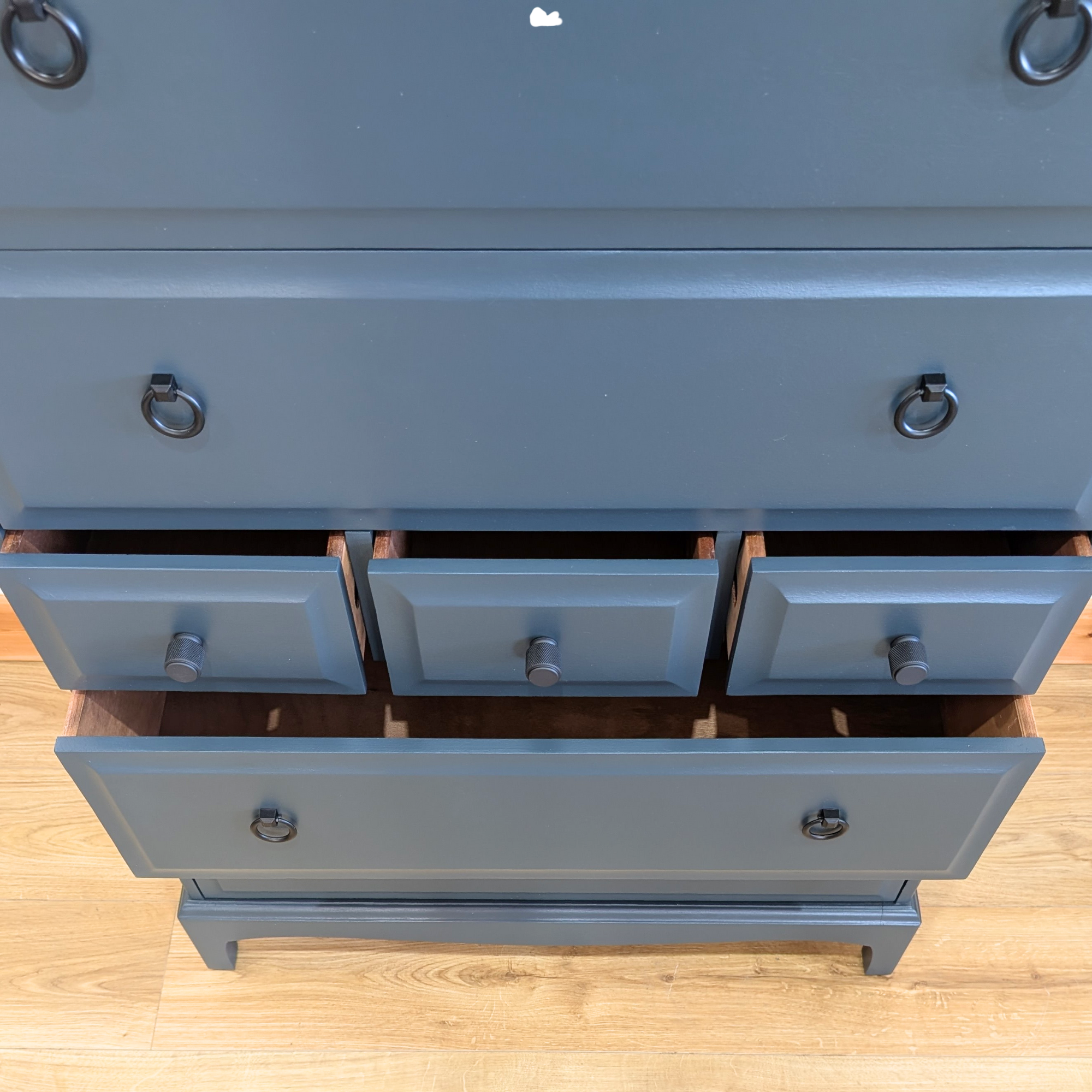 Stag Minstrel 7-drawer tallboy in dark neutral blue