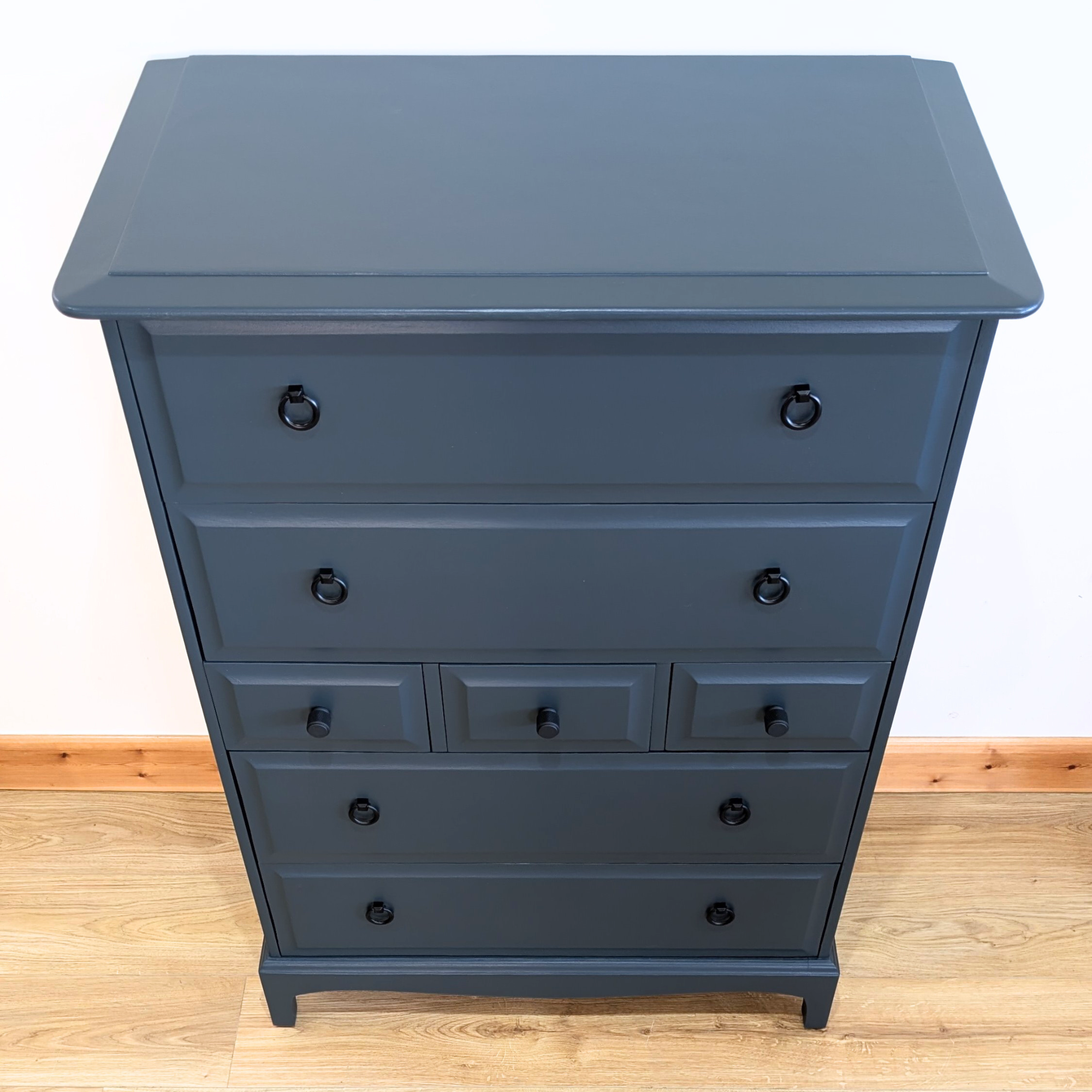 Stag Minstrel 7-drawer tallboy in dark neutral blue