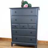 Stag Minstrel 7-drawer tallboy in dark neutral blue