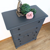 Stag Minstrel 7-drawer tallboy in dark neutral blue