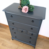 Stag Minstrel 7-drawer tallboy in dark neutral blue
