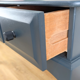 Stag Minstrel three-drawer console table in dark neutral blue