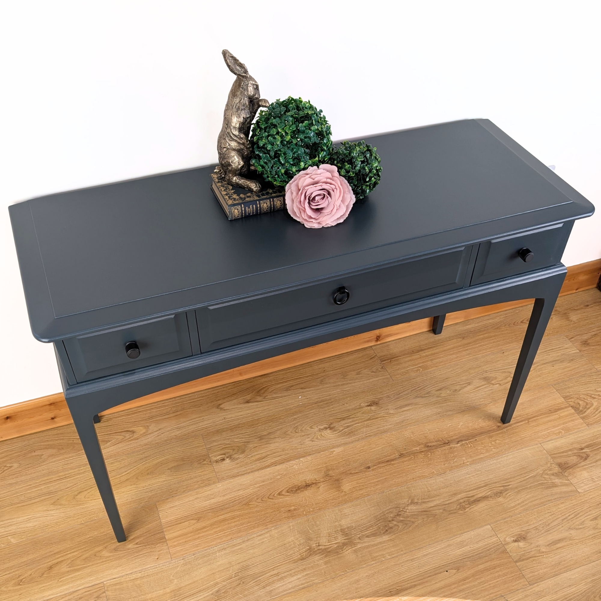Stag Minstrel three-drawer console table in dark neutral blue