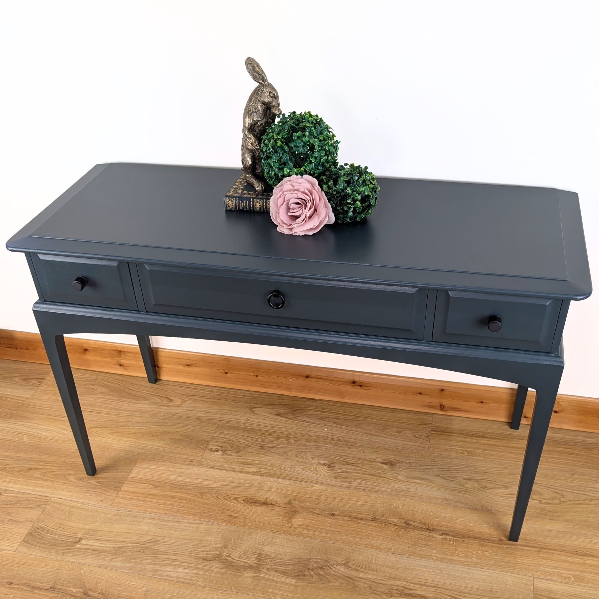 Stag Minstrel three-drawer console table in dark neutral blue