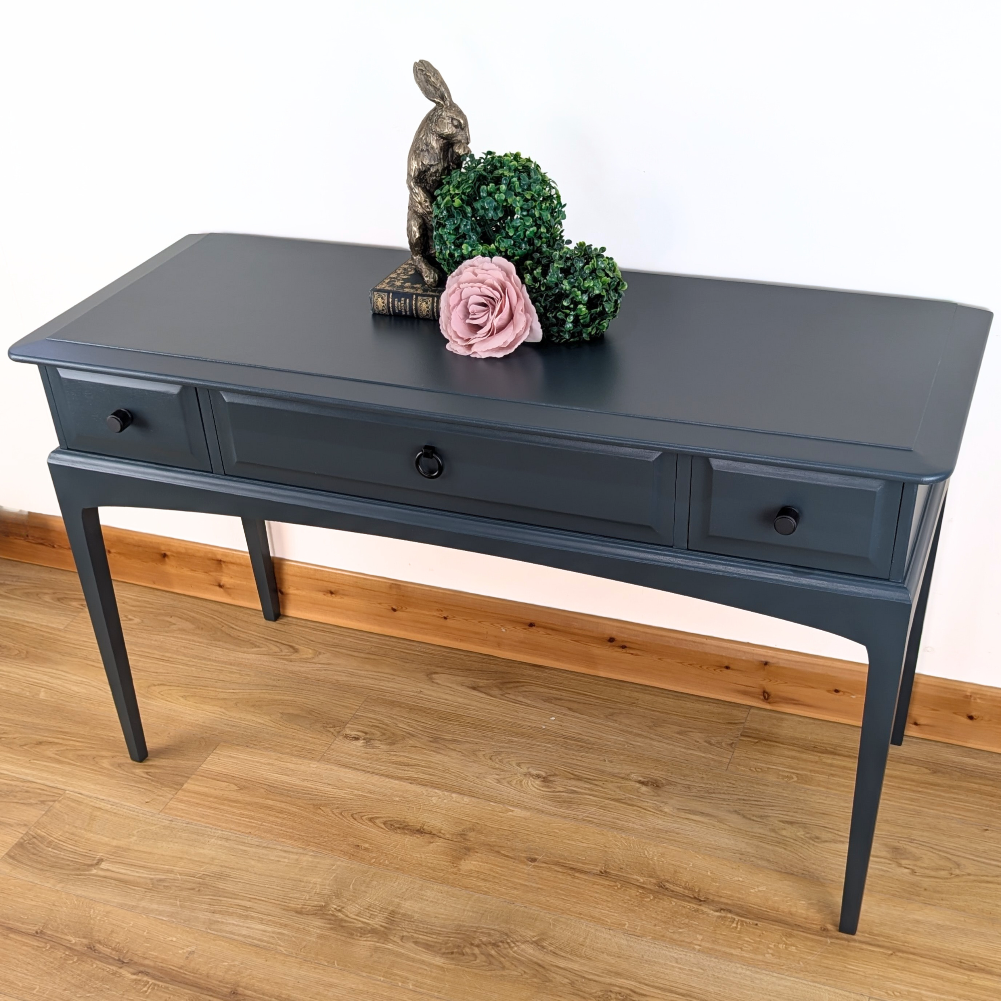 Stag Minstrel three-drawer console table in dark neutral blue