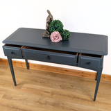Stag Minstrel three-drawer console table in dark neutral blue