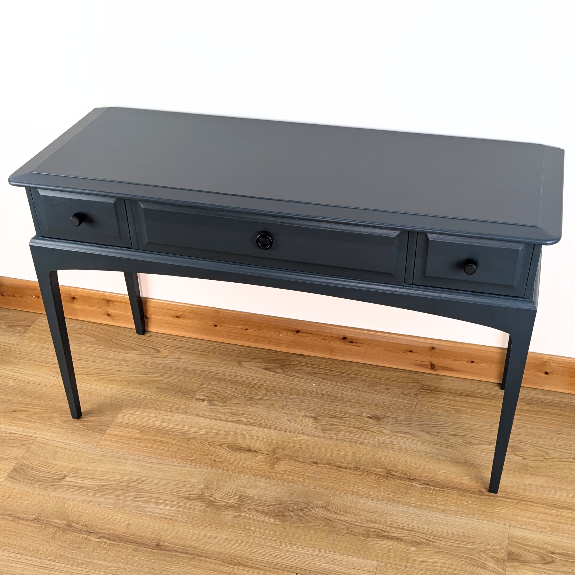 Stag Minstrel three-drawer console table in dark neutral blue