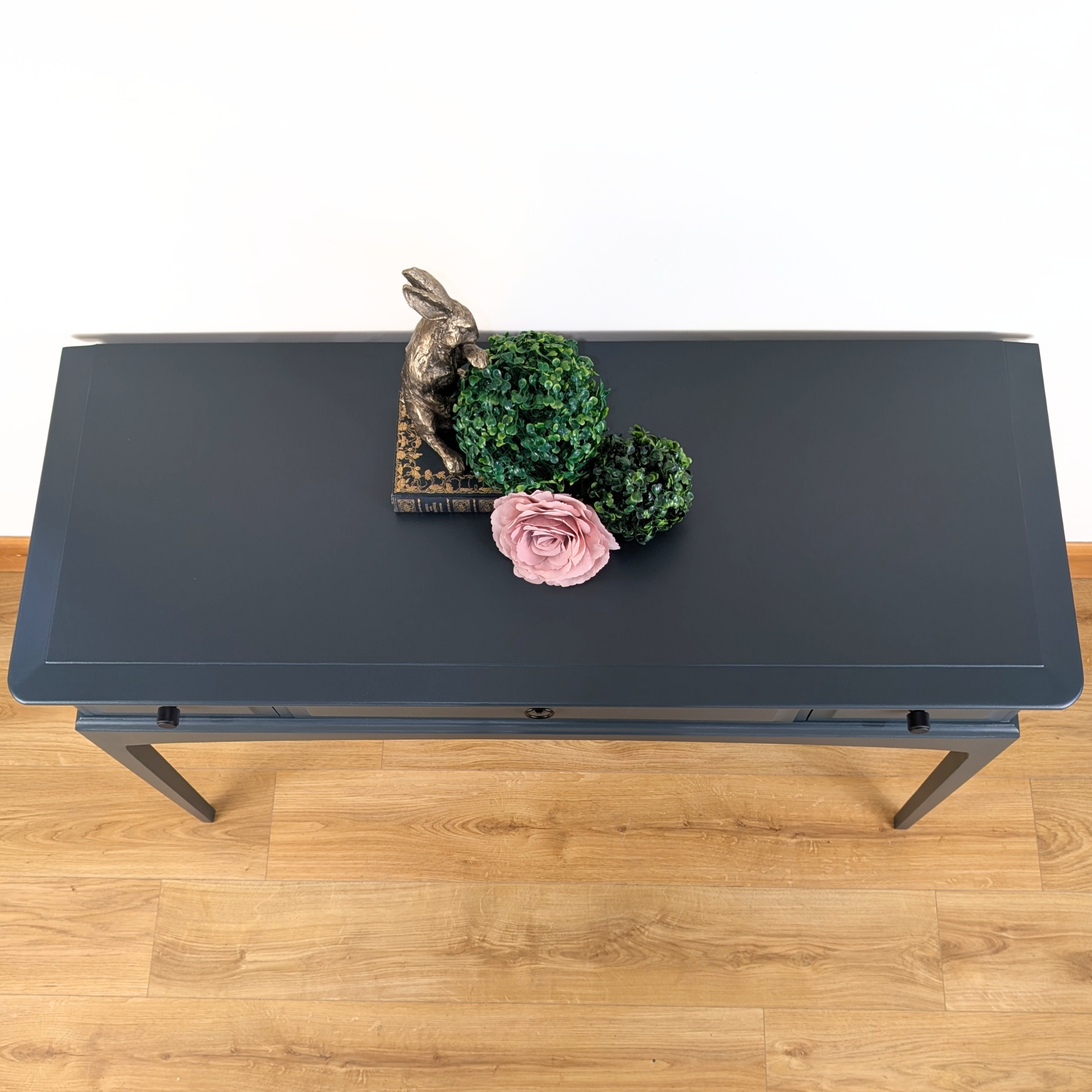 Stag Minstrel three-drawer console table in dark neutral blue