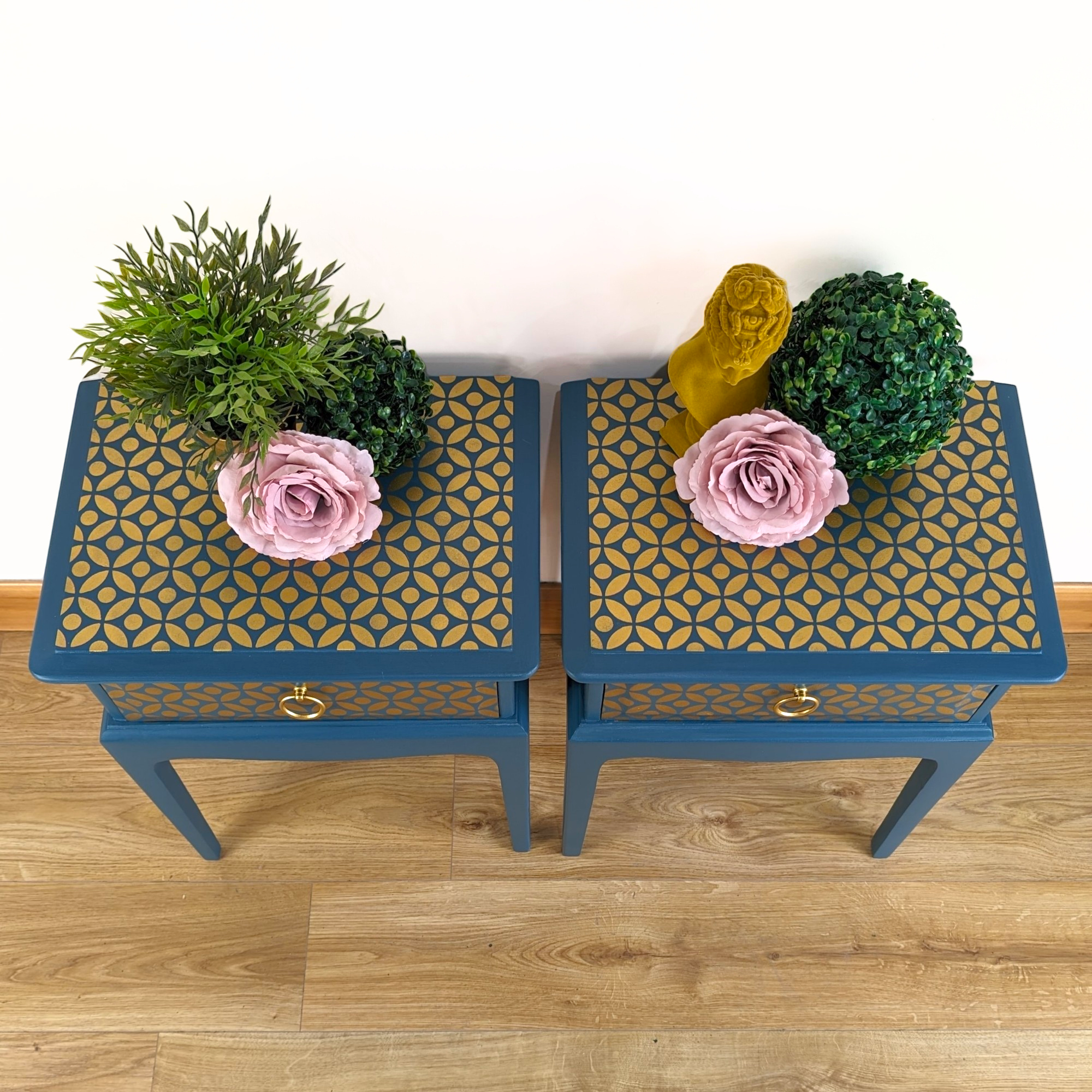 Pair of teal and gold leggy Stag Minstrel bedside cabinets