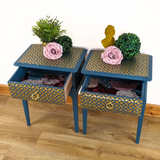 Pair of teal and gold leggy Stag Minstrel bedside cabinets