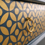 Pair of teal and gold leggy Stag Minstrel bedside cabinets
