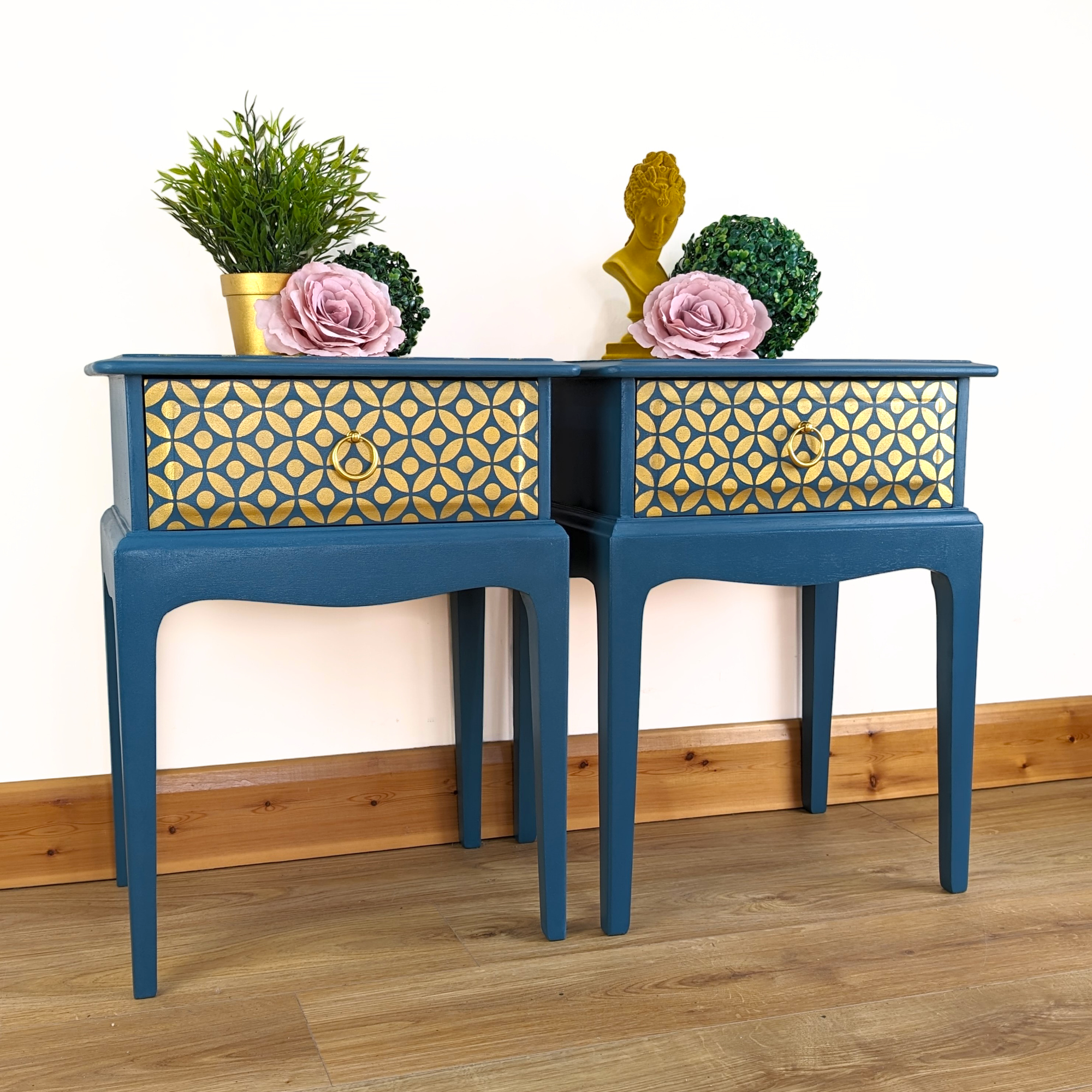 Pair of teal and gold leggy Stag Minstrel bedside cabinets