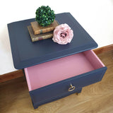 Pair of blue four drawer Stag Minstrel bedside cabinets