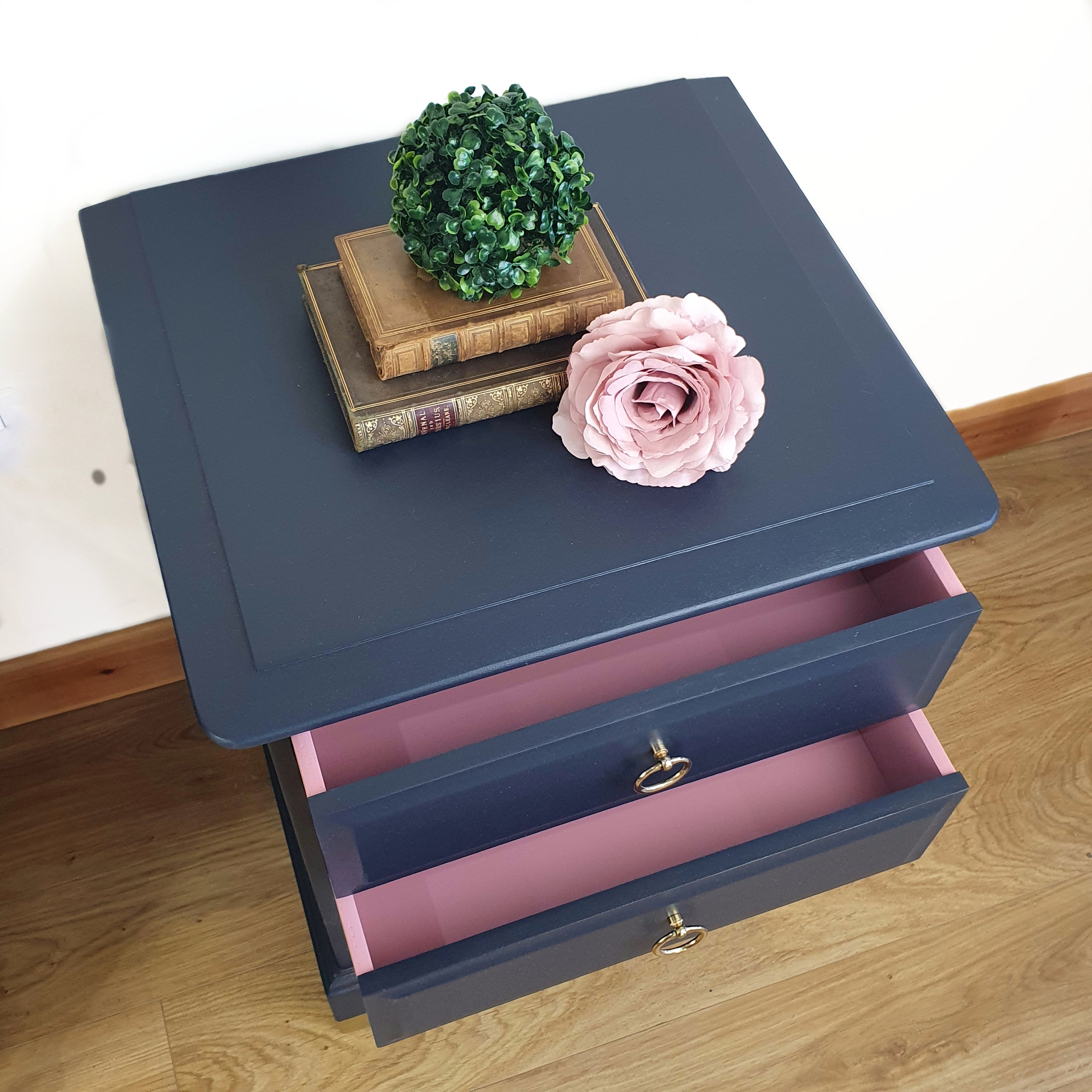 Pair of blue four drawer Stag Minstrel bedside cabinets