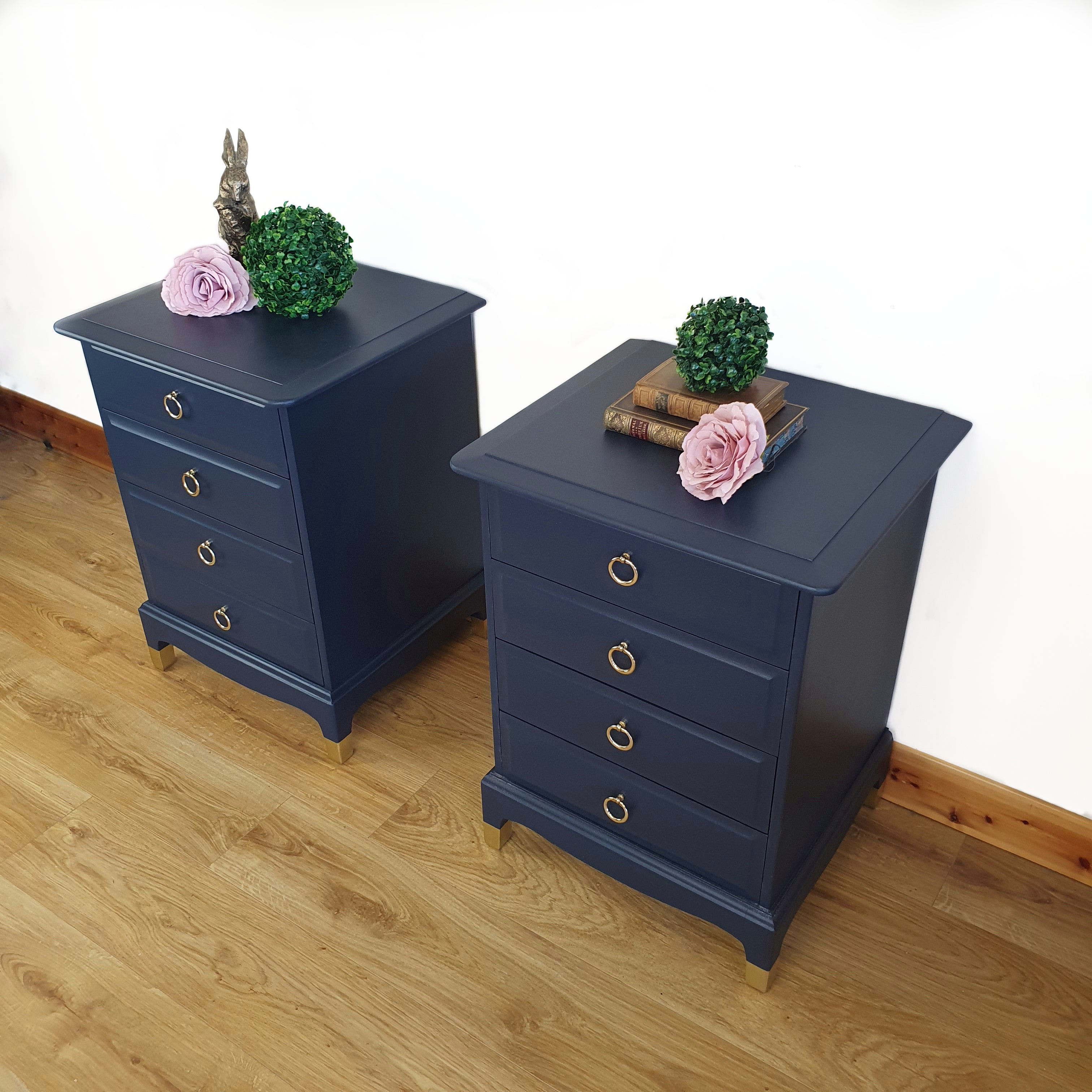 Pair of blue four drawer Stag Minstrel bedside cabinets