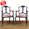 Pair of black-painted, upholstered armchairs