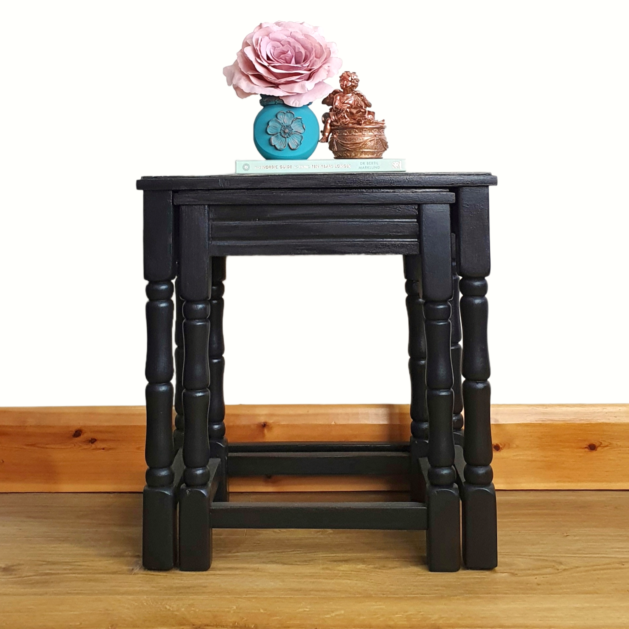 Nested pair of painted coffee tables with marbled tops