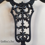 Black-painted, upholstered chair