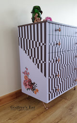 Pink Avalon chest of five drawers, with stripes and copper stencilling