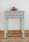 Small green desk or console table with lace stencilling