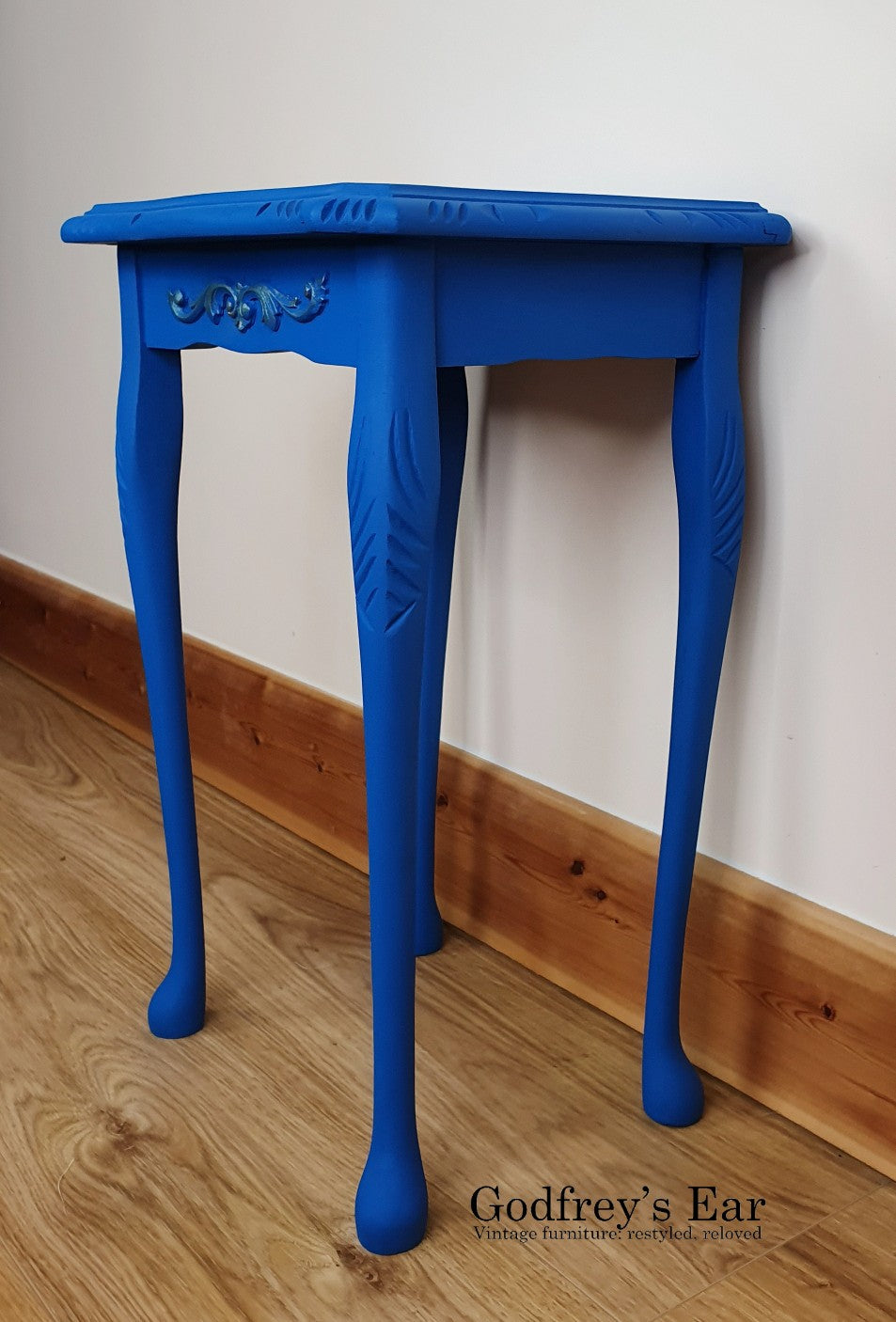 Blue side table, with découpaged top