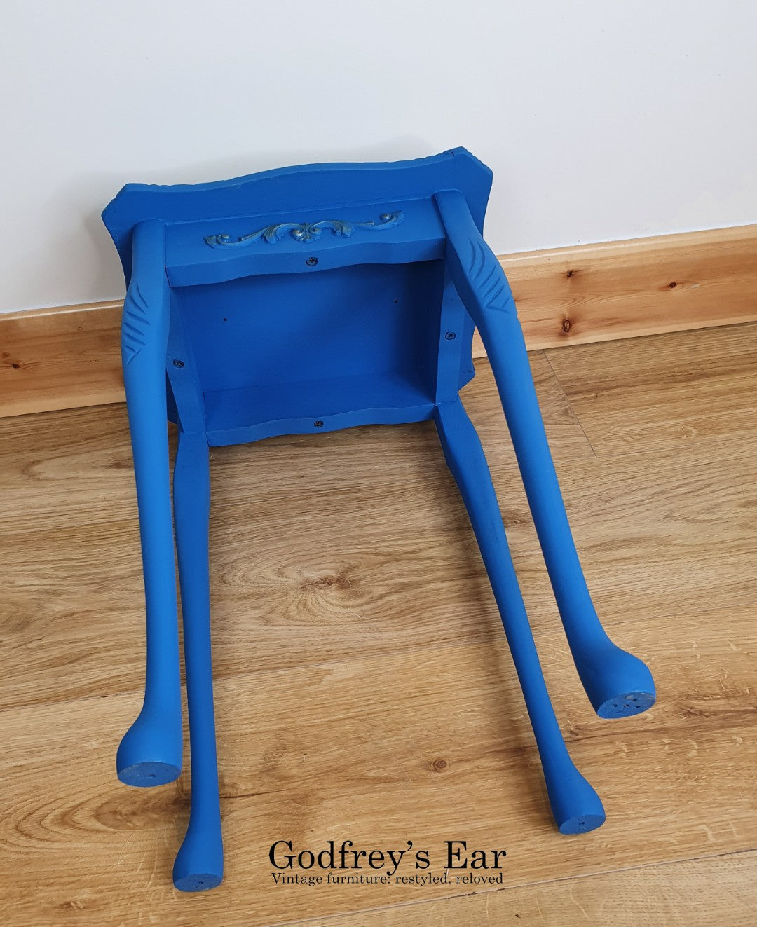 Blue side table, with découpaged top
