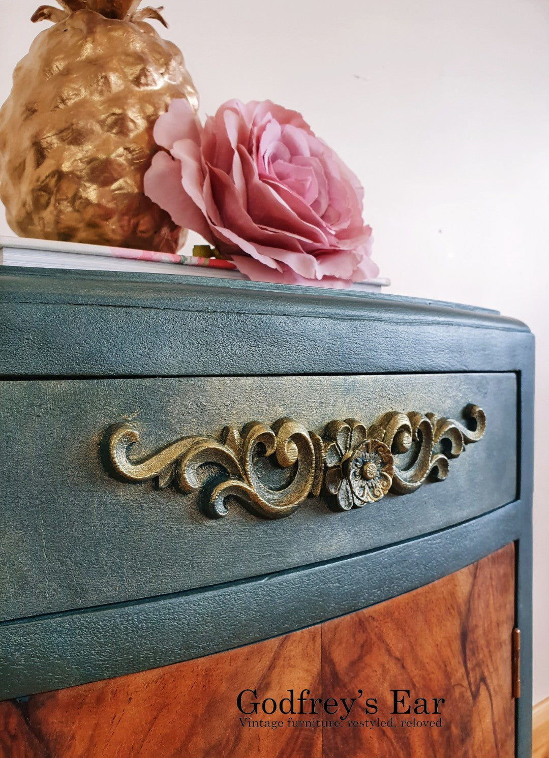 Green bedside cabinet with walnut door